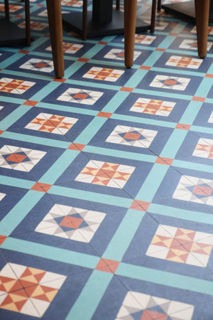 Colorful geometric tile design in a vibrant interior spaceの写真素材