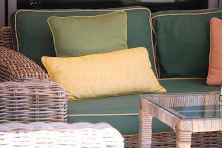 Cozy outdoor seating area with decorative cushions