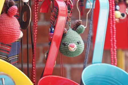 Colorful handmade keychains displayed at a craft market