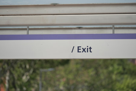 Sign indicating exit at a public transport stationの写真素材