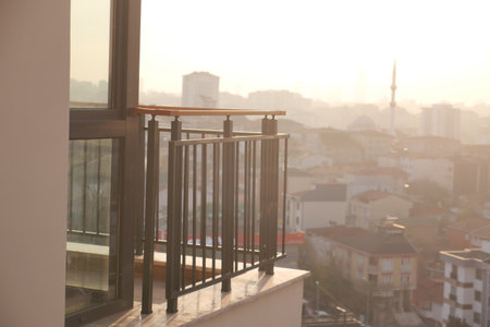 Beautiful morning view from a balcony in a cityの写真素材