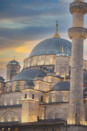 Majestic mosque stands against vibrant evening skyの写真素材