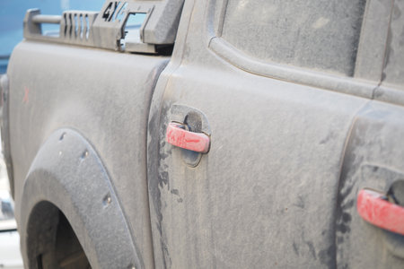 Truck covered in dust after off-road adventureの写真素材