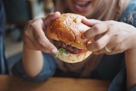Enjoying a delicious burger at a casual dining spot