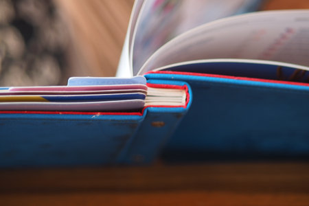 person explore the cafe menu colorful pages insideの写真素材