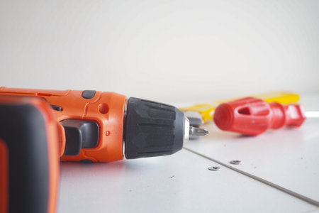 Tools arranged on a workbench for home improvement tasksの写真素材