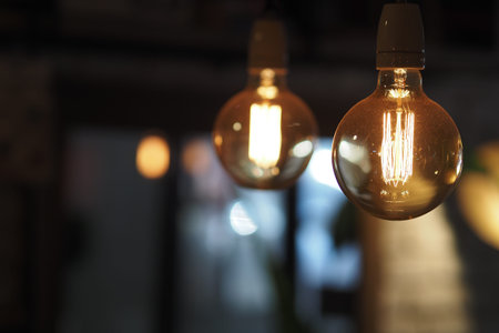 Warm light bulbs create inviting ambiance in cozy space