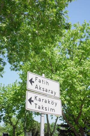 Two directional signs indicate routes to Fatih Aksaray and Karakoy Taksimの写真素材