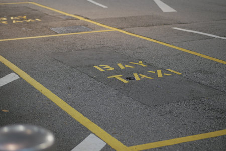 Taxi bay with visible markings in urban parking areaの写真素材
