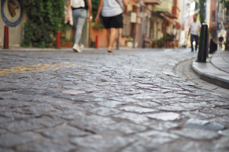 Cobblestone street shows life in historic areaの写真素材