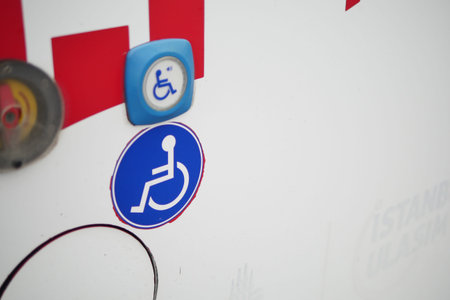 Accessibility symbols displayed on a vehicle surface