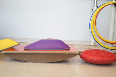 Colorful balance training equipment set in a gym