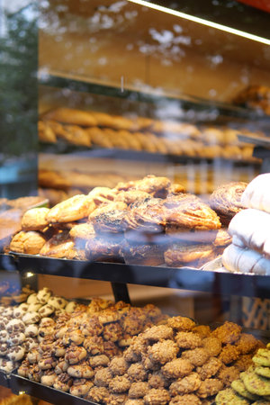 Freshly baked treats displayed in a bakery window