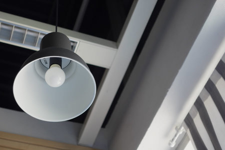 Modern overhead light fixture in stylish interior space