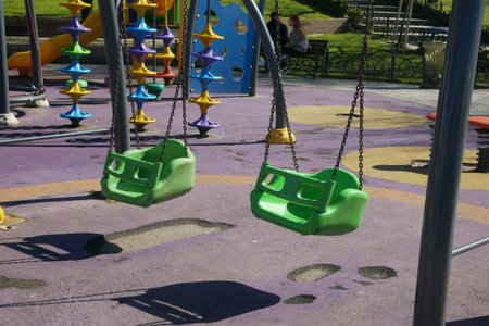 Colorful playground swings invite children to play