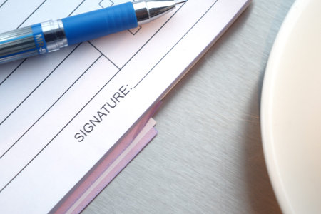 Documents and pen on a table for signing contracts