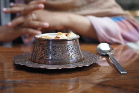 Ornate bowl of creamy soup on a table