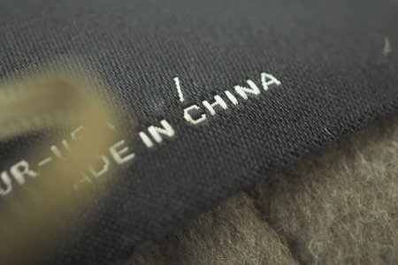 Text label showing manufacturing origin on fabricの写真素材