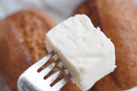Tasting fresh cheese at a farmers market event