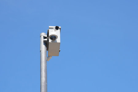 Surveillance camera monitoring traffic on a clear day