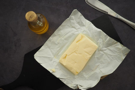 Butter and olive oil on a cutting surface for cooking