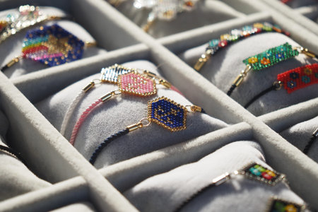 Colorful handcrafted bracelets displayed at a market stall
