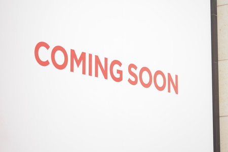 New business announcement sign in urban areaの写真素材