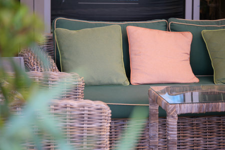 Comfortable seating arrangement in a cozy outdoor spaceの写真素材