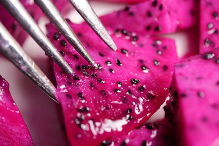 Vibrant dragon fruit slices ready to be enjoyedの写真素材