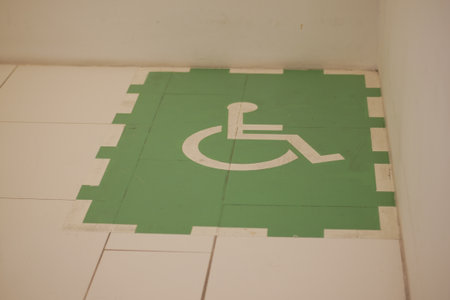 Green symbol for wheelchair-accessible spaceの写真素材