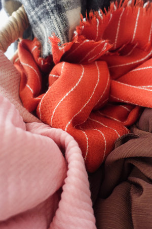 Colorful scarves and textiles in a cozy display