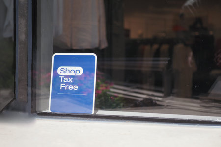 Sign promotes tax-free shopping at local retail storeの写真素材