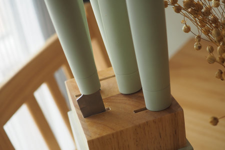 kitchen knife holder with stylish design on wooden tableの写真素材