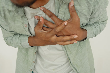 Chest discomfort in individual suggests medical issueの写真素材