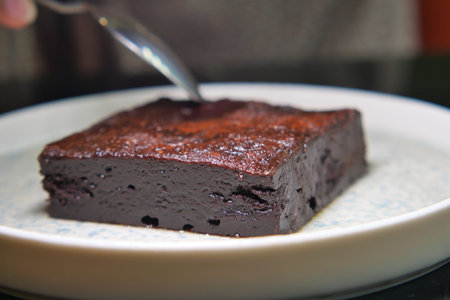 Chocolate dessert served on a plate at a dining table
