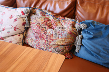Cozy couch with decorative pillows in a warm living room