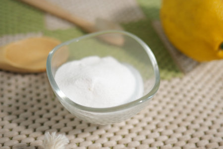 baking soda powder an lemon on a carpet for cleaningの写真素材