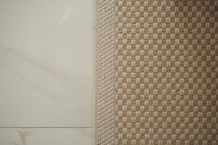 Natural woven rug on a light floor adds warmth to the room
