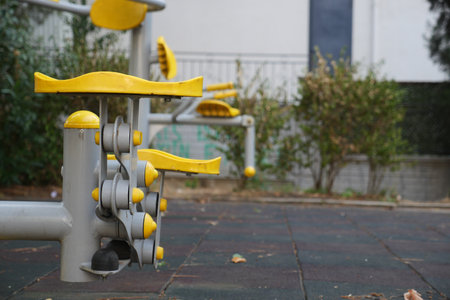 Outdoor fitness equipment in community park settingの写真素材