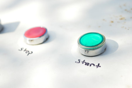 Bright green start button ready for action at outdoor eventの写真素材