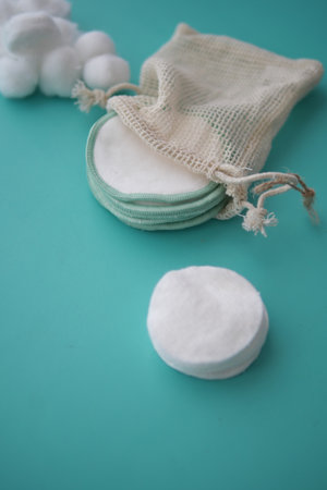 Reusable cotton pads for skincare on a bright backgroundの写真素材