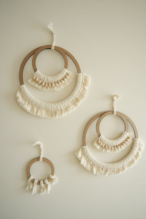 Unique wall hangings featuring natural fibers in a cozy room