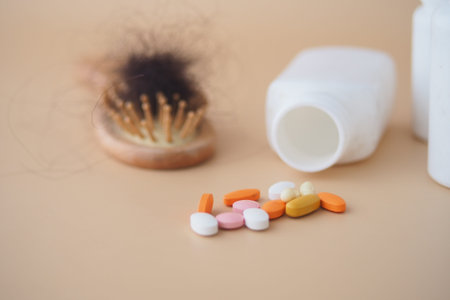 Health supplements and a hairbrush on a clean surface