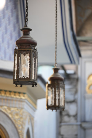 Elegant hanging lanterns in a historical building interiorの写真素材