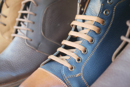Stylish leather shoes displayed at a market stallの写真素材