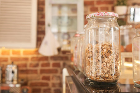 Various jars filled with dry tea leaves.の写真素材