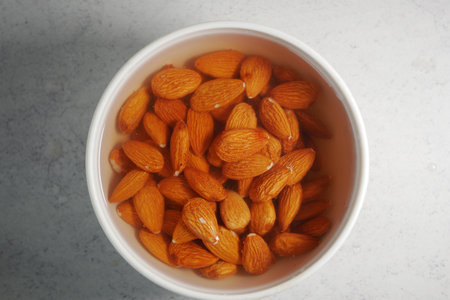 Soaked almonds ready for preparation and cookingの写真素材