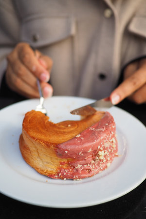 Delicious pastry being enjoyed in a cozy settingの写真素材