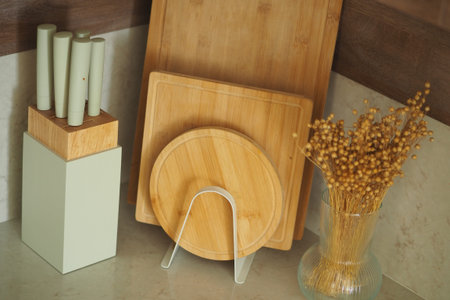 Modern kitchen display featuring bamboo utensils and decorの写真素材
