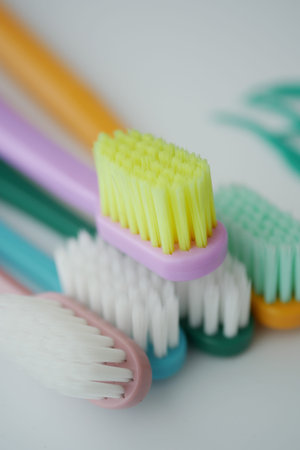 Colorful toothbrushes arranged for oral hygiene routine